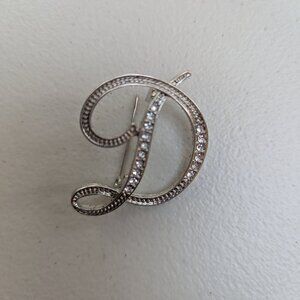 D pin, costume pin in uppercase letter D